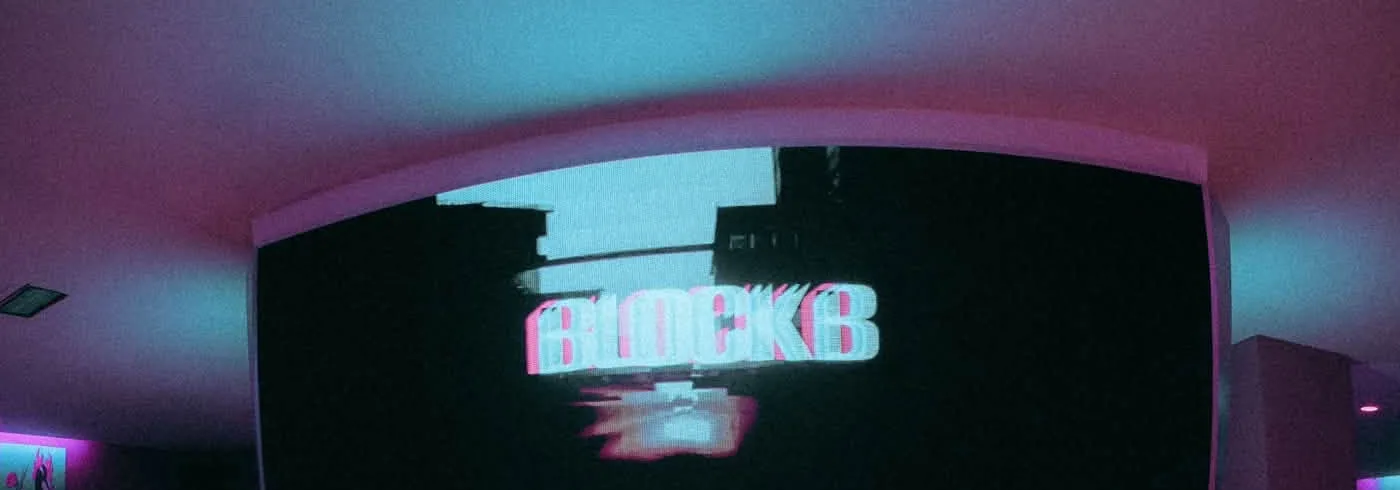 Block B Hà Nội — màn LED chữ BLOCKB dưới vòm trần